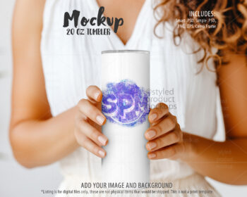 Mockup of model holding 20oz skinny tumbler